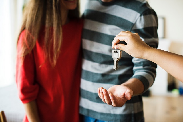 A Couple Holding the Keys to Their New Home in Placerville, California